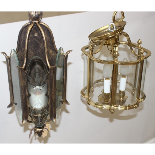 246 - An antique style brass hall lantern with curved glass panels and a distressed metal and etched glass... 