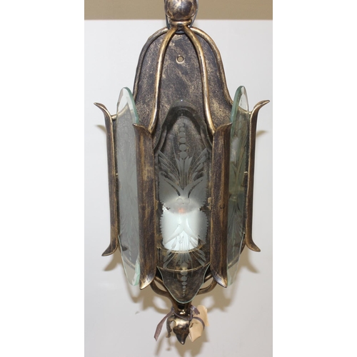 246 - An antique style brass hall lantern with curved glass panels and a distressed metal and etched glass... 