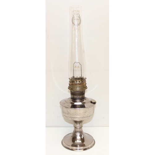 247 - 4 oil lamps to include an Aladdin 23 oil lamp with glass chimney and 3 smaller lamps, largest approx... 