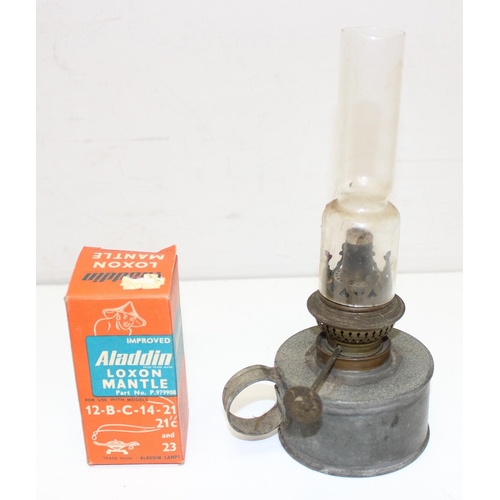 247 - 4 oil lamps to include an Aladdin 23 oil lamp with glass chimney and 3 smaller lamps, largest approx... 