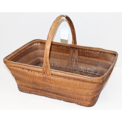 279 - 4 assorted vintage wicker baskets of various designs, the largest approx 60cm wide