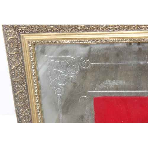 368 - A very large vintage mirror emblazoned with 