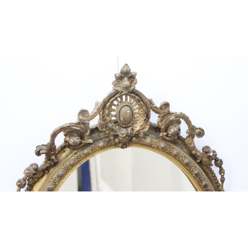 388 - A 19th century gilt framed oval girandole wall mirror, the mirror made from giltwood and gesso with ... 