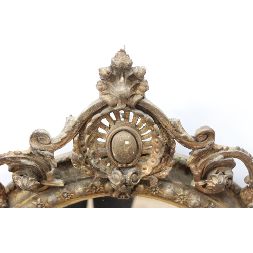 388 - A 19th century gilt framed oval girandole wall mirror, the mirror made from giltwood and gesso with ... 