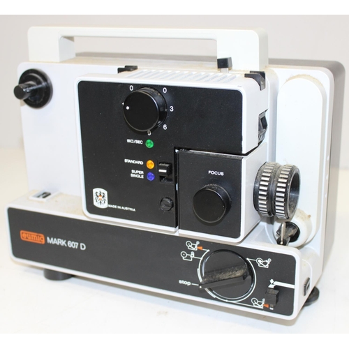 731 - Qty of projector and other film gear to include Eumia mark 697D projector, a qty of reels and an 8mm... 