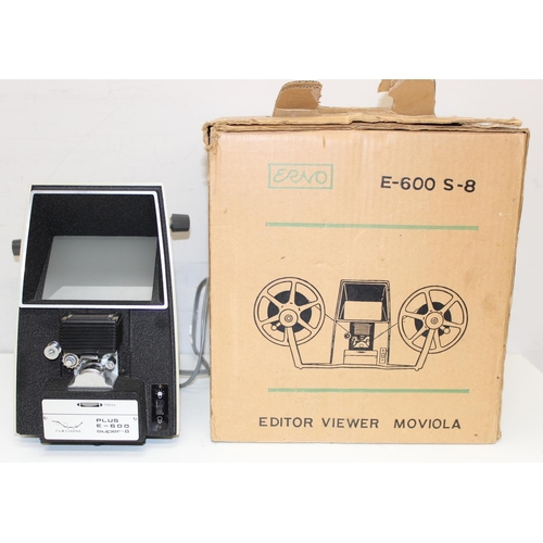 731 - Qty of projector and other film gear to include Eumia mark 697D projector, a qty of reels and an 8mm... 