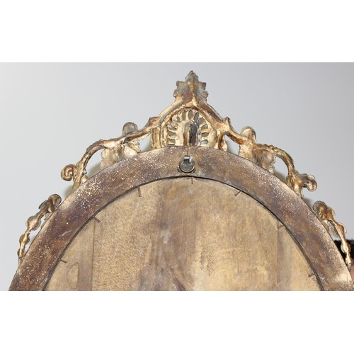 388 - A 19th century gilt framed oval girandole wall mirror, the mirror made from giltwood and gesso with ... 