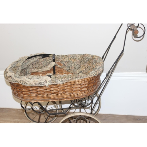 136 - 2 antique style prams, one fabric and wirework, the other wicker on metal frame, the largest approx ... 