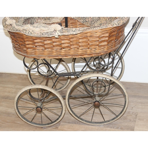 136 - 2 antique style prams, one fabric and wirework, the other wicker on metal frame, the largest approx ... 