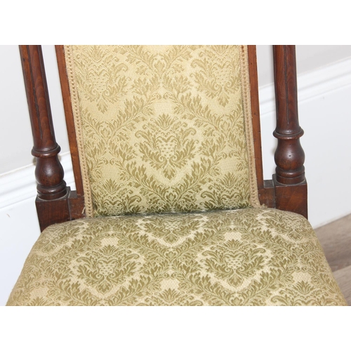 137 - A Victorian mahogany Prie Dieu chair with reeded supports and green patterned upholstery, approx 96c... 