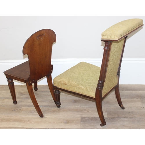 137 - A Victorian mahogany Prie Dieu chair with reeded supports and green patterned upholstery, approx 96c... 