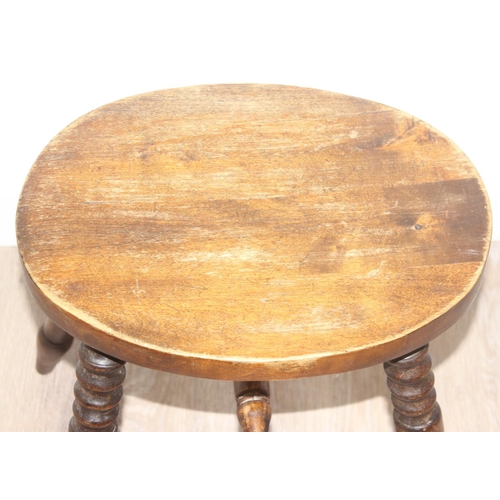 149 - An antique wooden stool with turned legs, approx 46cm tall