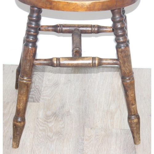 149 - An antique wooden stool with turned legs, approx 46cm tall