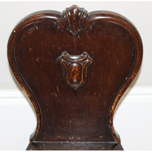 151 - A 19th century stained pine hall chair, approx 85cm tall