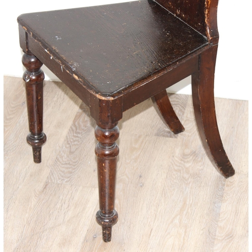 151 - A 19th century stained pine hall chair, approx 85cm tall