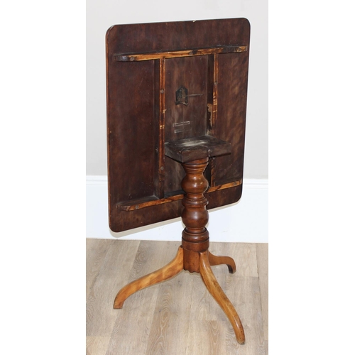 156 - A 19th century mahogany tilt topped table with turned support and tripod base, approx 82cm wide x 67... 