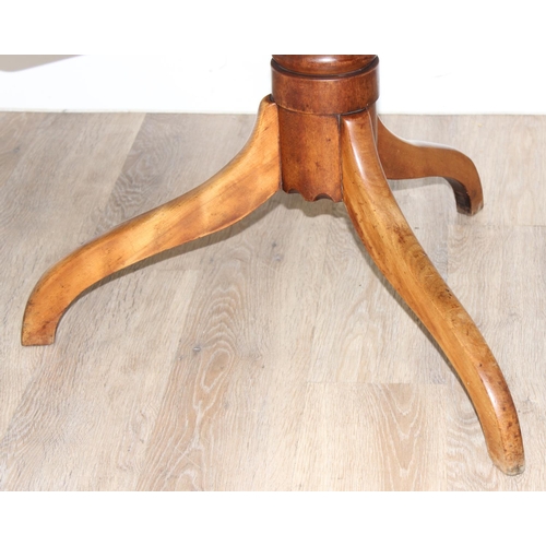 156 - A 19th century mahogany tilt topped table with turned support and tripod base, approx 82cm wide x 67... 