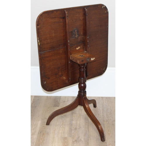 158 - A 19th century mahogany tilt topped table with turned support and tripod base, approx 74cm wide x 70... 