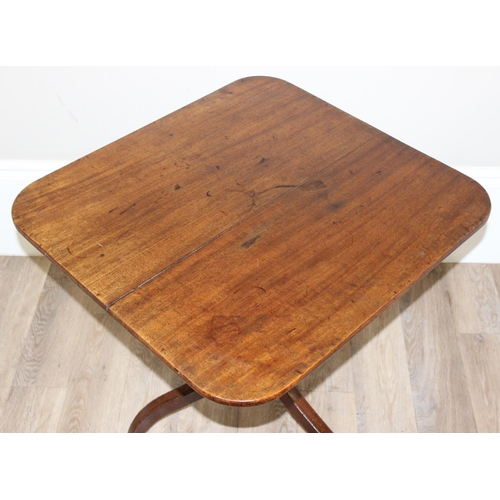 158 - A 19th century mahogany tilt topped table with turned support and tripod base, approx 74cm wide x 70... 