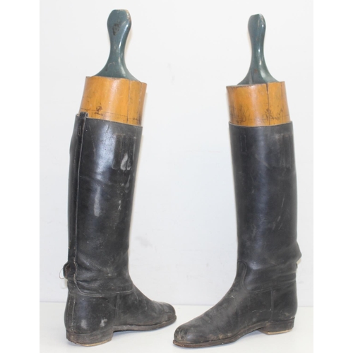 216 - Pair of vintage riding boots with 4 piece wooden boot trees