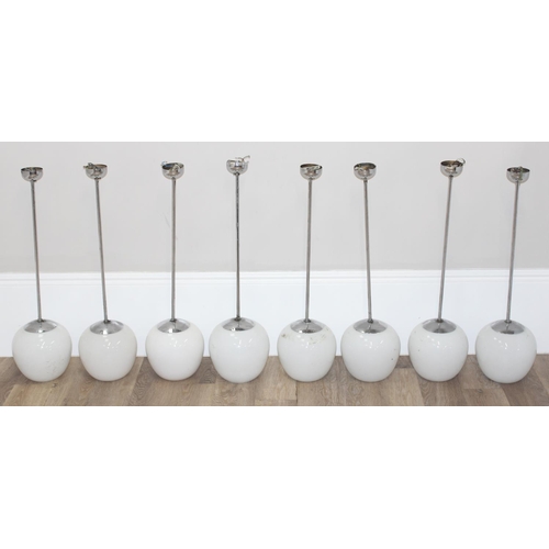 248 - 8 assorted retro style chrome and opaque glass ceiling lights, each approx 84cm tall, with 2 spare s... 