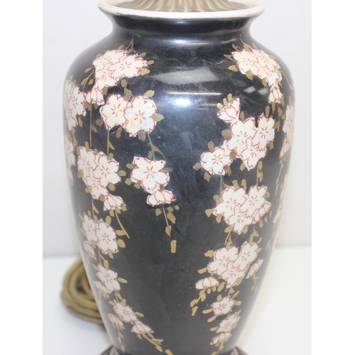 252 - An Oriental black glazed and floral decorated table lamp, possibly Japanese, approx 40cm tall