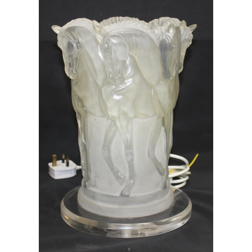 258 - A Lalique style frosted Perspex table lamp formed as a number of horses, approx 31cm tall