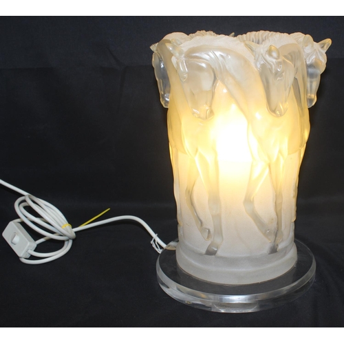 258 - A Lalique style frosted Perspex table lamp formed as a number of horses, approx 31cm tall