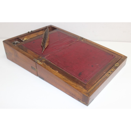 281 - An antique walnut writing slope with brass corners, a mahogany and ebonised desk stand with 2 inkwel... 