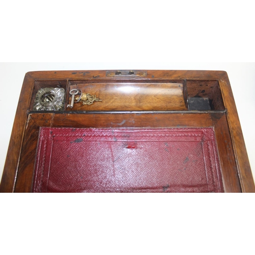 281 - An antique walnut writing slope with brass corners, a mahogany and ebonised desk stand with 2 inkwel... 