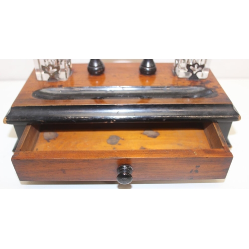 281 - An antique walnut writing slope with brass corners, a mahogany and ebonised desk stand with 2 inkwel... 