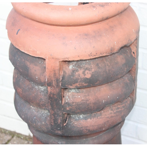 302 - An antique terracotta chimney pot, approx 86cm H