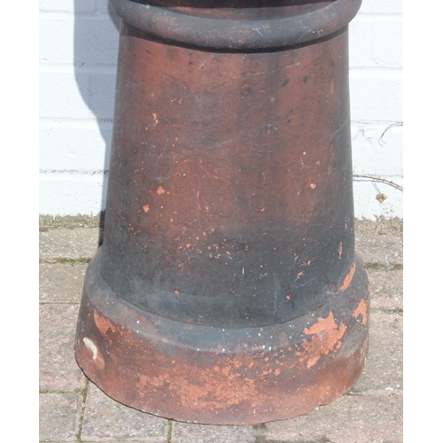 302 - An antique terracotta chimney pot, approx 86cm H