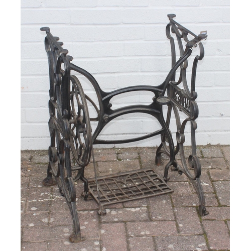 310 - An early 20th century Harris's cast iron sewing machine table base, ideal garden table base, approx ... 