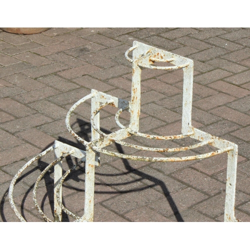 318 - A vintage 3 tier wrought iron plant stand with distressed white painted finish, approx 80cm wide x 4... 