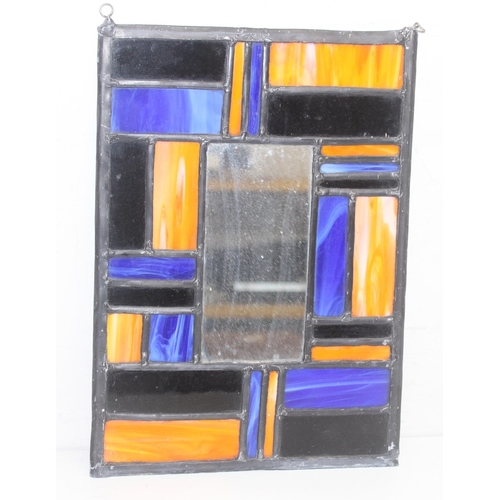 392 - 3 vintage colourful leaded glass panels, one set with a central mirror, the largest approx 47cm x 46... 