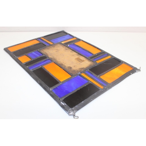 392 - 3 vintage colourful leaded glass panels, one set with a central mirror, the largest approx 47cm x 46... 