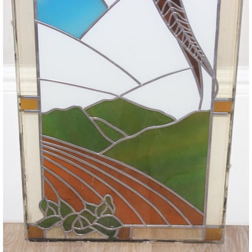 402 - A large vintage stained glass panel depicting a pheasant in flight, approx 120cm x 40cm