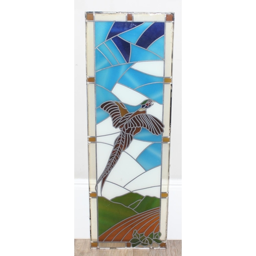 402 - A large vintage stained glass panel depicting a pheasant in flight, approx 120cm x 40cm