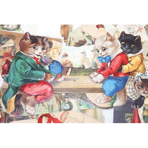 557 - A large qty of assorted Victorian scrapbook or decoupage cut outs, mainly of cats and animals