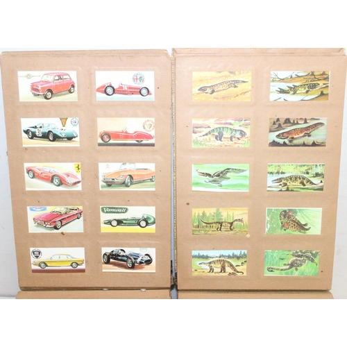 569 - Qty of tea and cigarette cards in albums to include Brook Bond Tea and Wills Cigarettes etc, 2 large... 