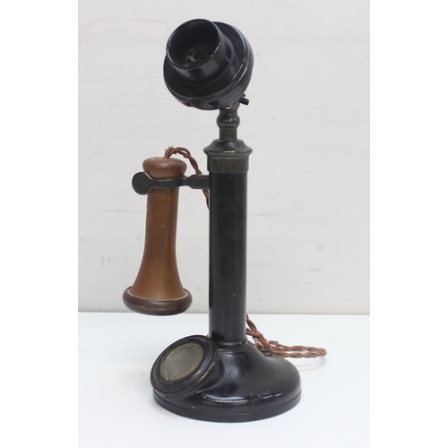 740A - A vintage candlestick telephone, marked in various places 