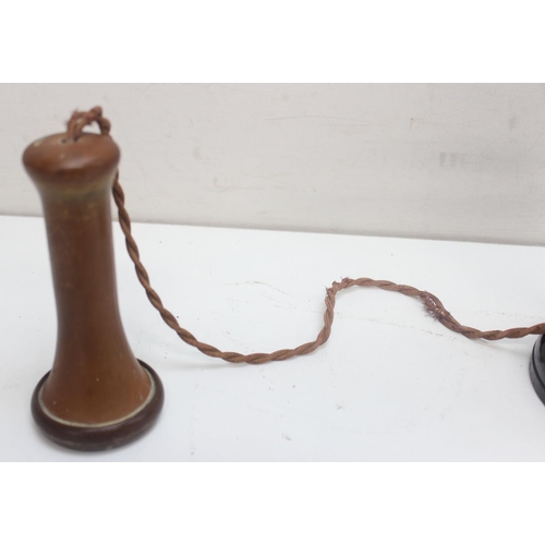 740A - A vintage candlestick telephone, marked in various places 