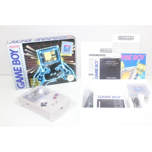 758 - A vintage Nintendo Game Boy in original packaging to include Tetris game, manuals and cables