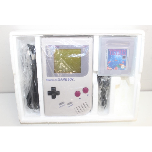 758 - A vintage Nintendo Game Boy in original packaging to include Tetris game, manuals and cables