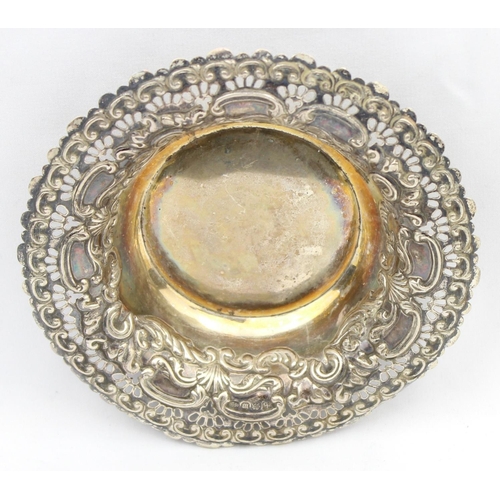 1014 - A Victorian embossed silver bonbon dish with gilt lined interior, Birmingham 1896 by Hayes Brothers,... 