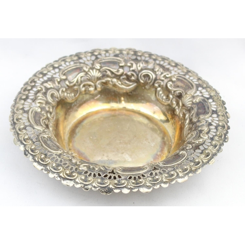 1014 - A Victorian embossed silver bonbon dish with gilt lined interior, Birmingham 1896 by Hayes Brothers,... 