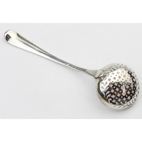 1036 - An 18th century silver sifter spoon with bright cut decoration, London 1756-1775 by Thomas Chawner, ... 