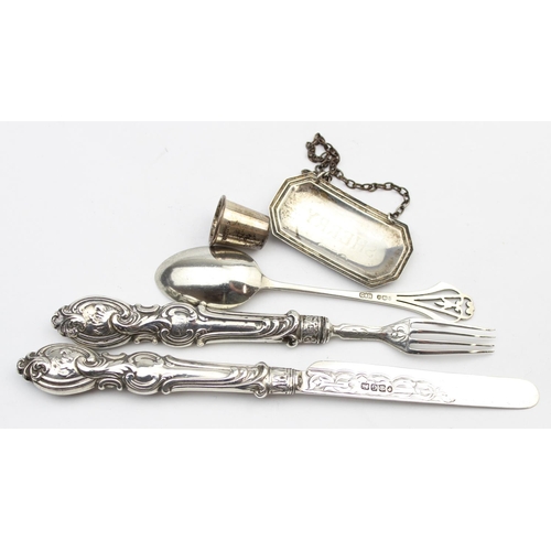 1038 - A boxed silver thimble, a Victorian silver fruit knife and fork with silver blades and tines, an Art... 