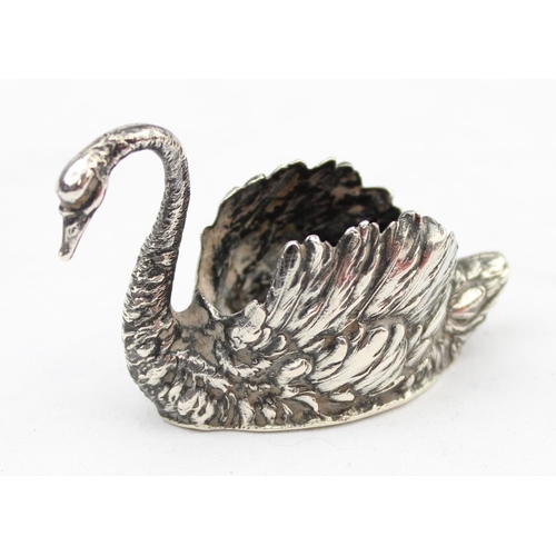 1055 - An antique silver swan pin cushion, lacking interior, marked to base indistinctly but XRF confirmed ... 